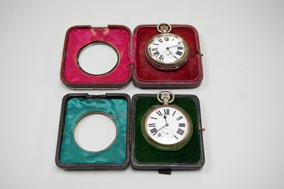 Two Edwardian silver mounted leather travelling watch cases, Chester 1905 and Birmingham, 1907, both containing a chrome cased keyless pocket watch.